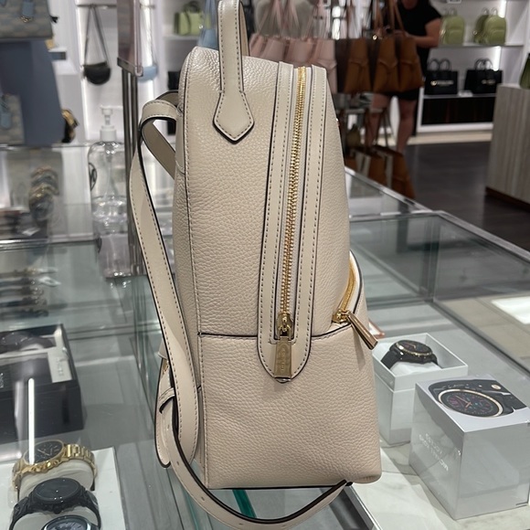 Michael Kors Women's Valerie Medium Pebbled Leather Backpack
Light Cream 
NWT - Picture 11 of 16